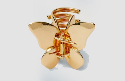 Χρυσό κοκαλάκι μαλλιών €7.99 από Stradivarius   