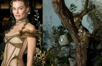 Η Margot Robbie σε goth διάθεση με κόσμημα πένθους στο κόκκινο χαλί